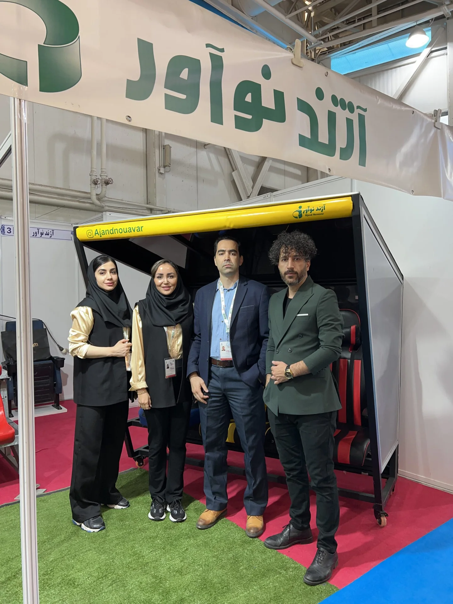 Ajand Noavar team at a specialist sports-equipment exhibition