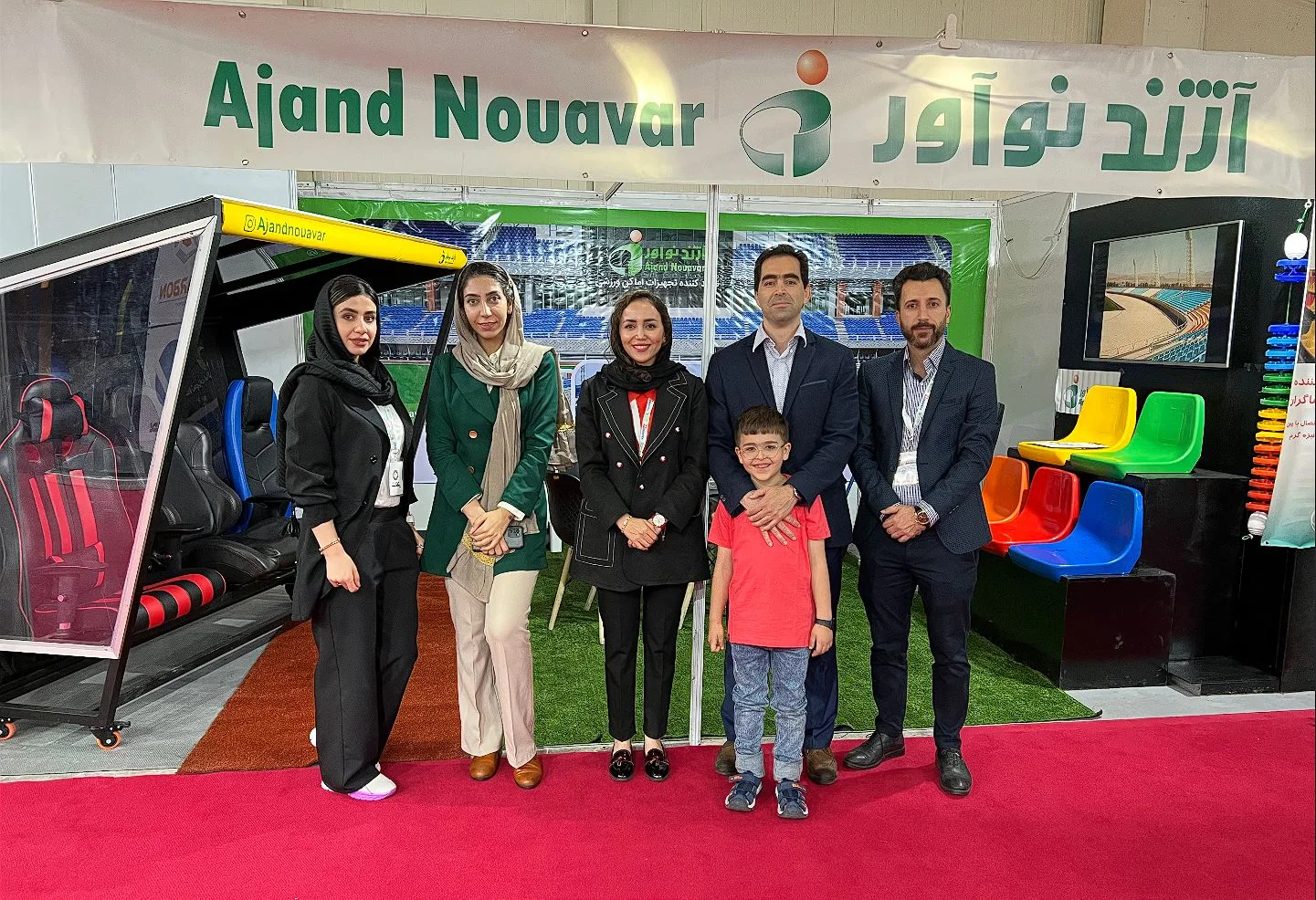 Ajand Noavar team at a specialist sports-equipment exhibition